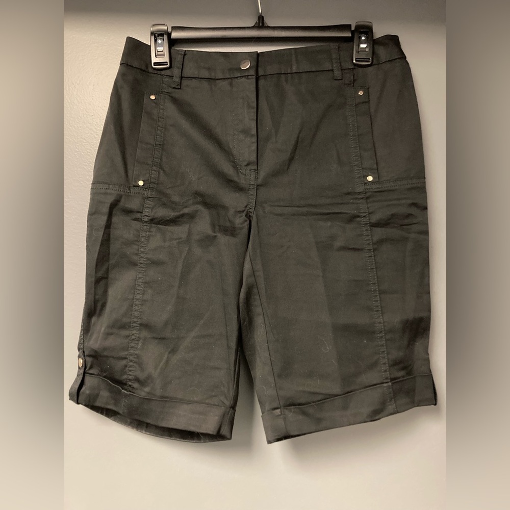 Chico’s black fashion faux snap, slit pocket shorts with full zip.